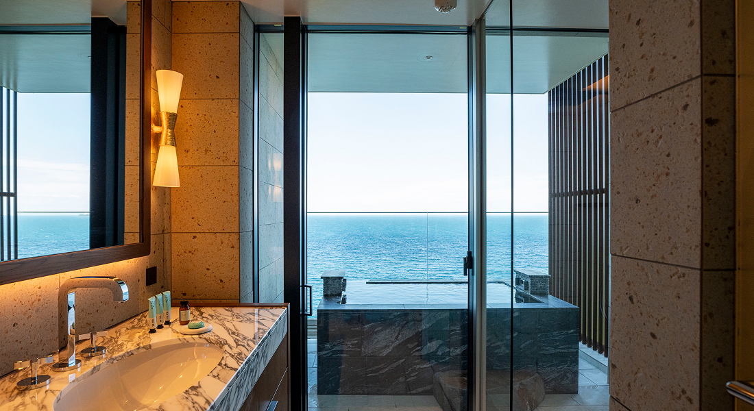 Photo: Bathroom with an ocean view