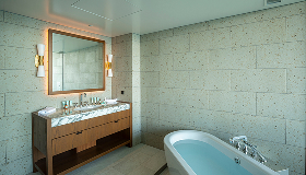 Photo: Large mirror and inside view of the bathroom