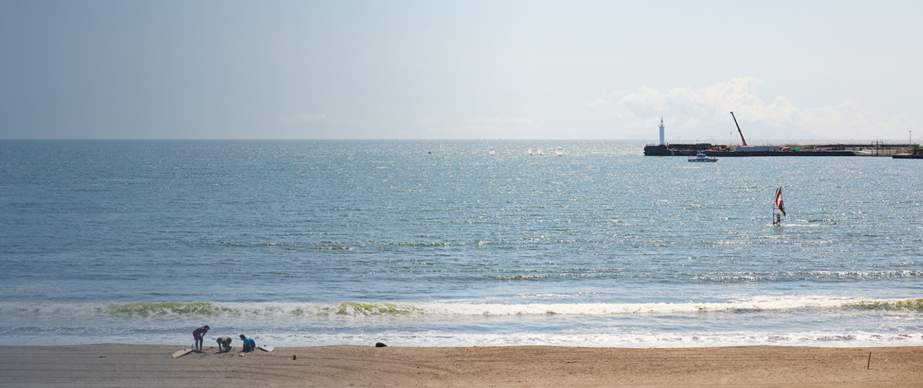 Daytime view of people doing marine sports as seen from UMITO